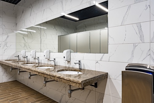 Modern sinks with mirror in public toilet