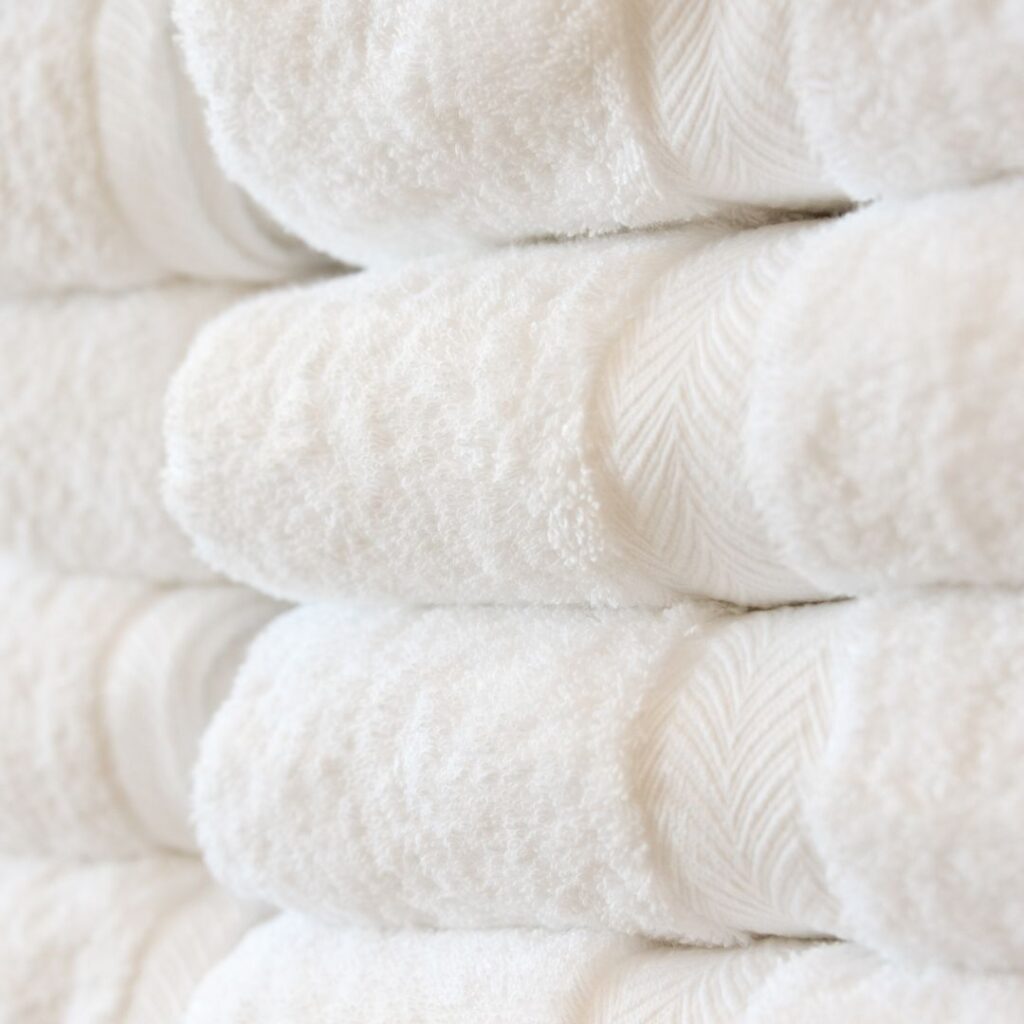 folded white towels